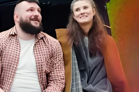 Bill and Jane in rain during enemy to lover romance story