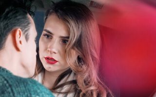 Blind date emotional confrontation between man and woman in romantic tension story
