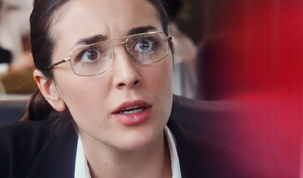 Woman exposing toxic boss during office discrimination story interview
