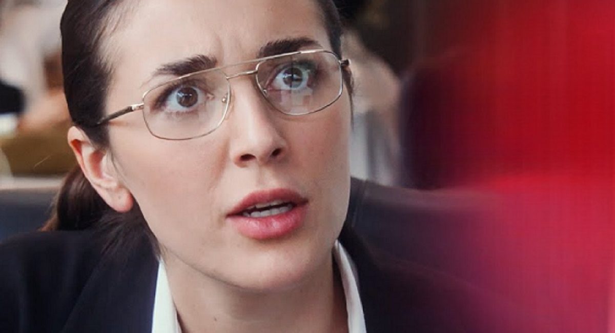 Woman exposing toxic boss during office discrimination story interview